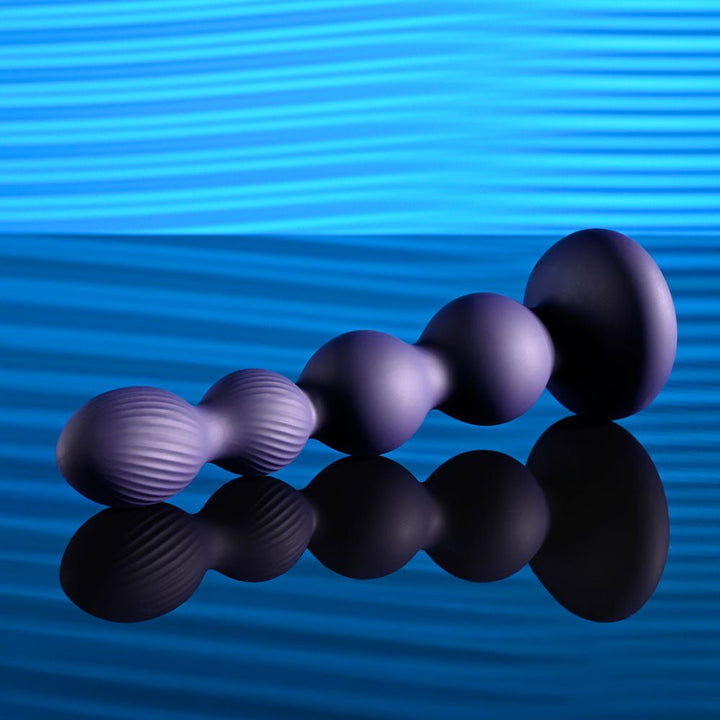 Evolved PLEASURE ORBIT - Navy Blue 17.8 cm USB Rechargeable Twirling & Vibrating Anal Beads with Remote – Sex toys NZ by Naughtyhut. Discreet delivery nationwide.