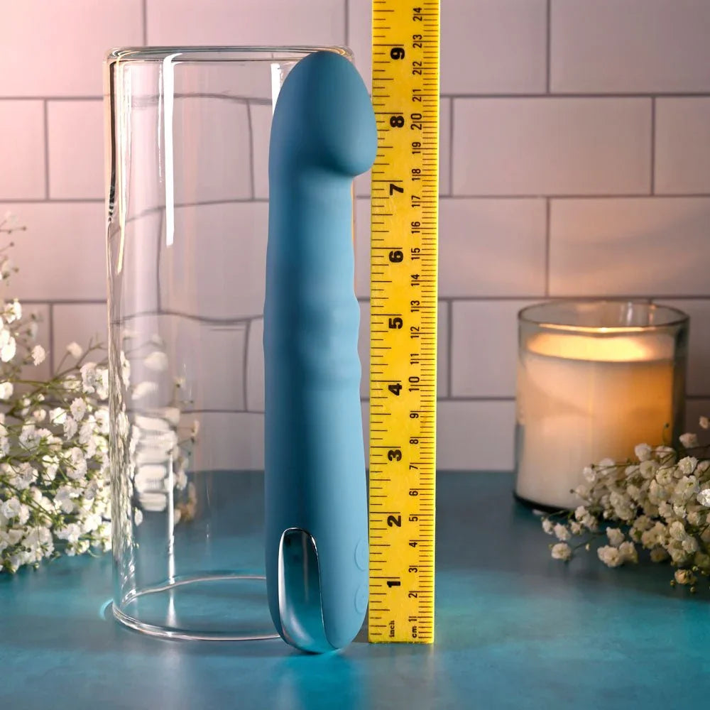 Evolved Queen Of All Trades in teal blue beside a tape measure, reading about 9 inches