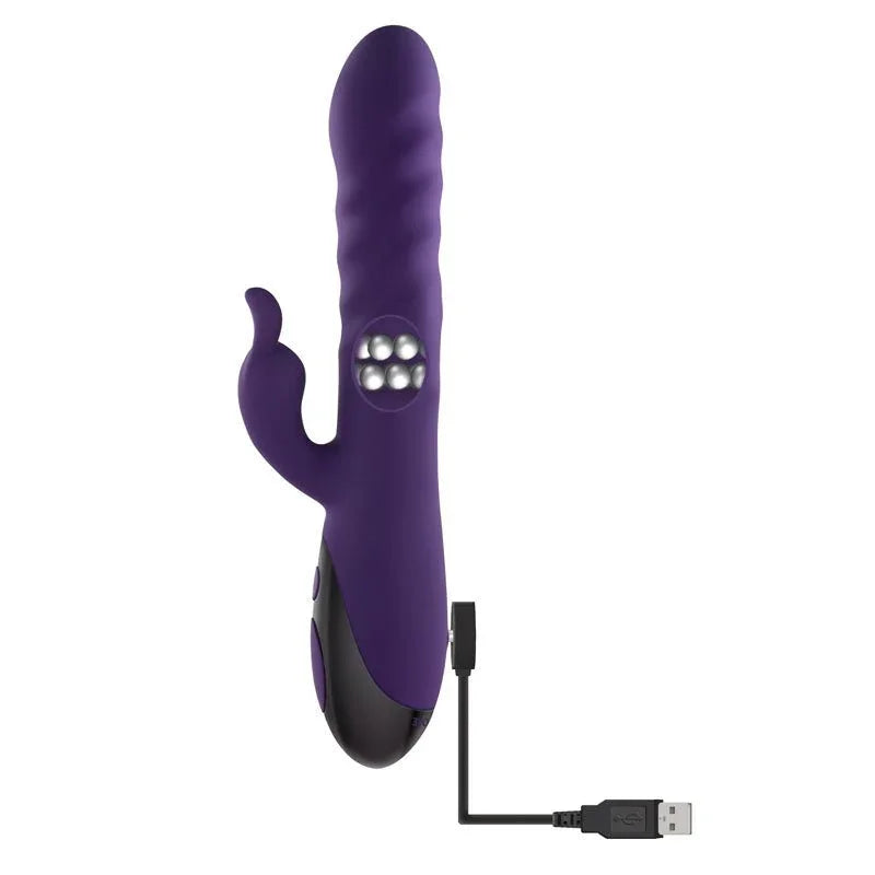 Evolved Rascally Rabbit in Purple on a plain white background with its USB charging cable attached