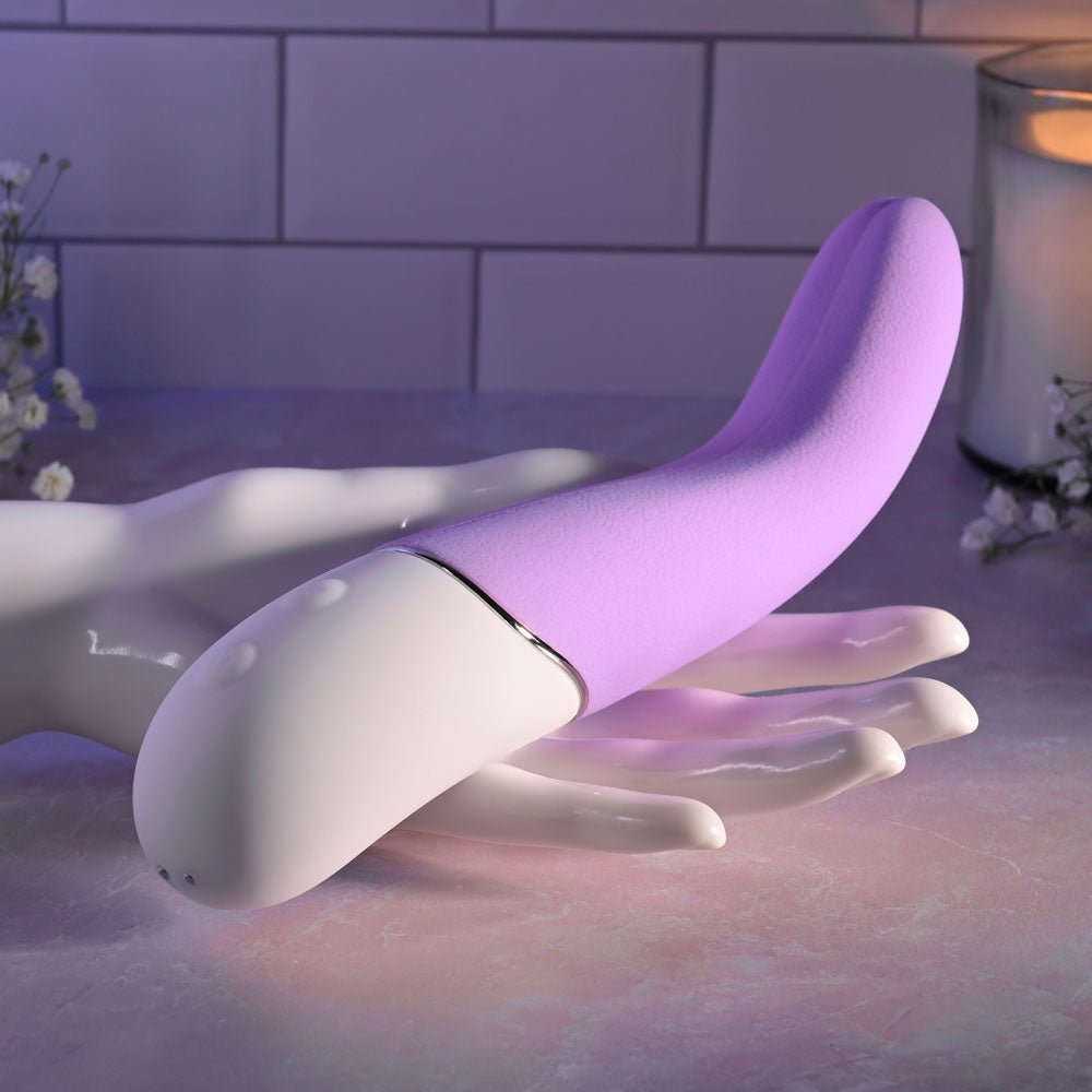 Buy Evolved SLIP OF THE TONGUE - Purple 21.1 cm USB Rechargeable Flicking Tongue Vibrator – Naughtyhut NZ sex toys online. Discreet delivery & top brands.