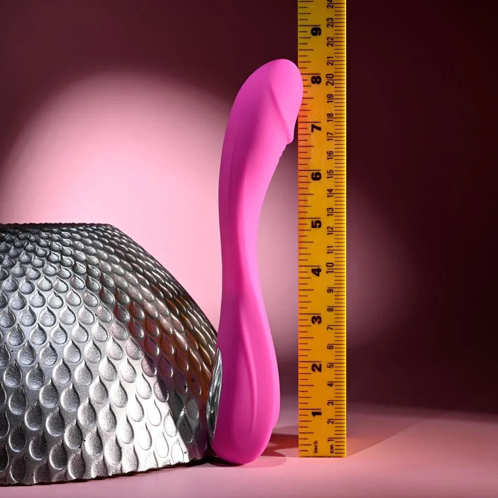 Evolved Sugar Rush in Pink upright beside a tape measure, reading about 8.5 inches