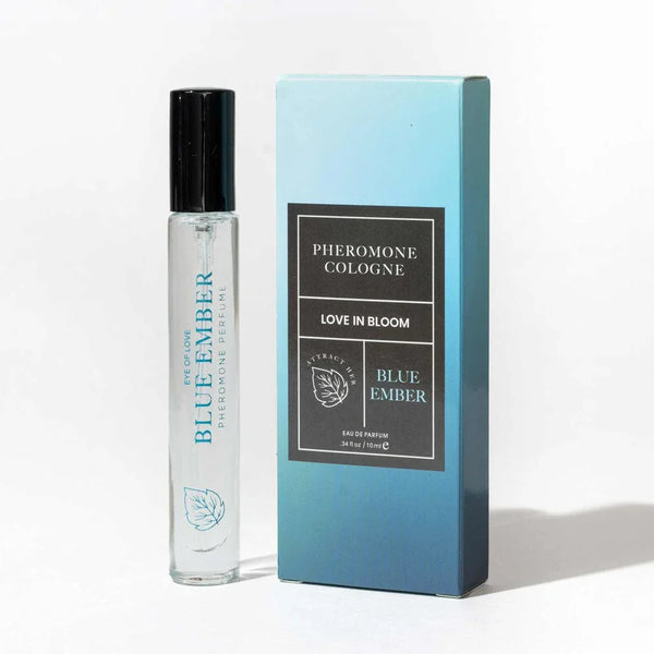 Eye Of Love Love In Bloom Blue Ember Cologne 10ml, slim spray vial beside its pale blue box
