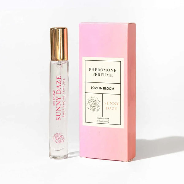 Eye Of Love Love In Bloom Sunny Daze Perfume 10ml, gold-capped vial beside its pink box