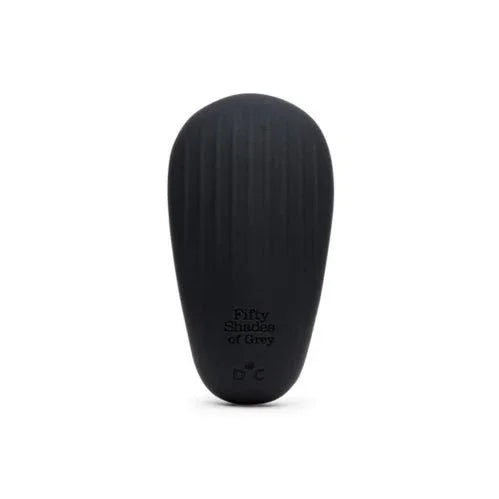 Fifty Shades of Grey Sensation Clitoral Vibrator in Black, pebble-shaped lay-on