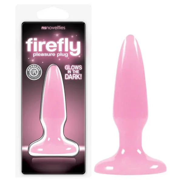 Firefly Pleasure Plug in Pink, tapered mini plug beside its pink glow-in-the-dark pack