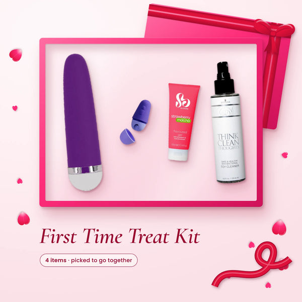 First Time Treat Kit: a purple bullet, Romp Free X, strawberry matcha lube and a toy cleaner spray on a pink backdrop