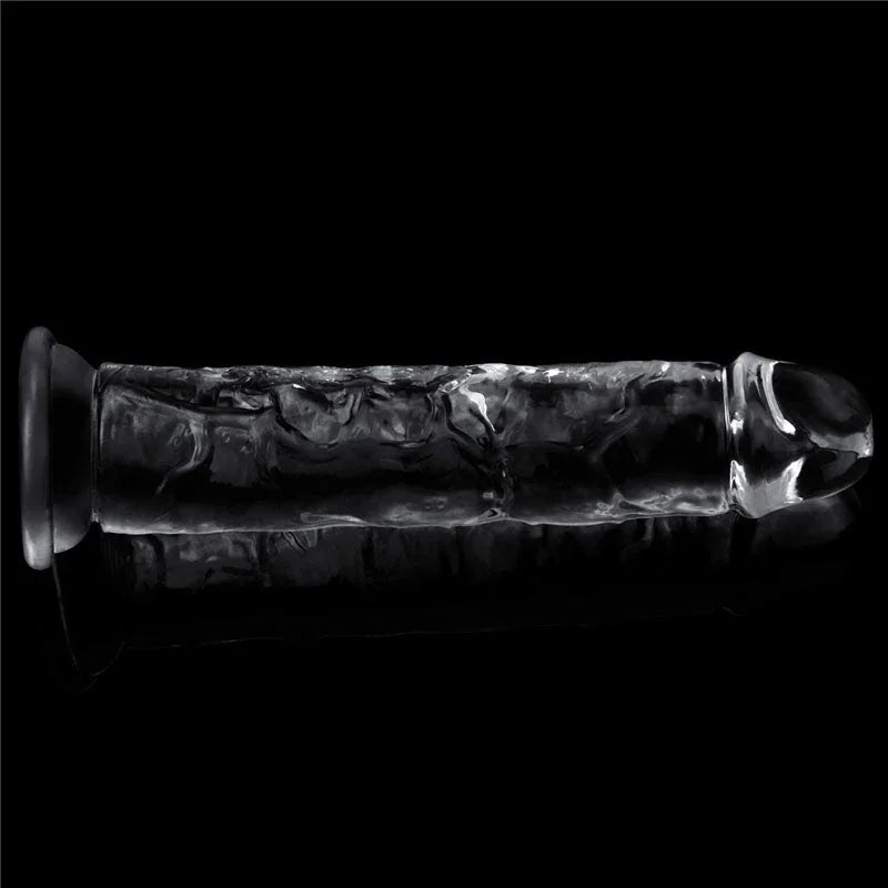 Flawless Clear 7 inch dildo lying flat, seen end-on down the transparent shaft