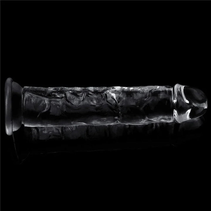 Flawless Clear 7 inch dildo lying flat, seen end-on down the transparent shaft