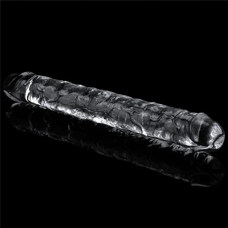 Flawless Clear double dildo at an angle on black, light through the transparent shaft