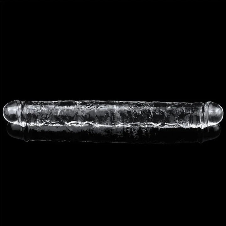Flawless Clear double dildo lying horizontally on black, a head at each end