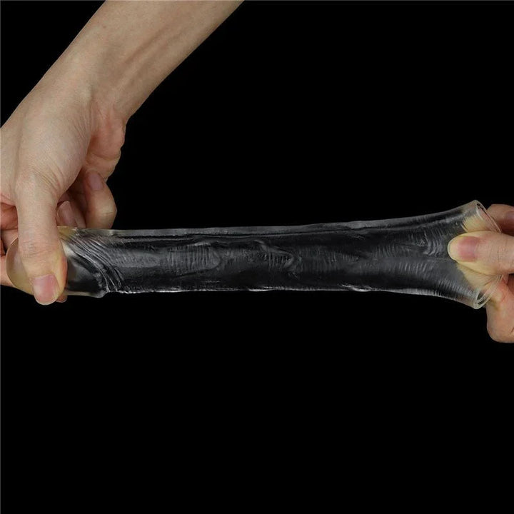 Two hands stretching the Flawless Clear sleeve lengthways to show how far it gives