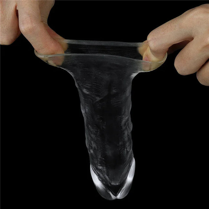 Fingers pulling the mouth of the Flawless Clear sleeve wide open