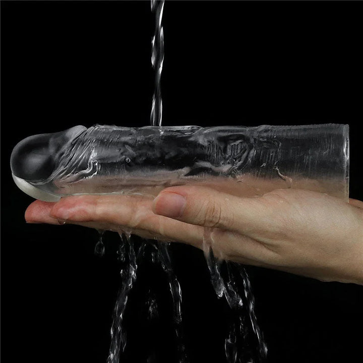 Flawless Clear sleeve rinsed under running water across a hand