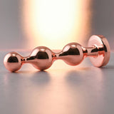 Buy Gender X GOLD DIGGER SMALL - Rose Gold Small Butt Plug with Black Gem Base – Naughtyhut NZ sex toys online. Discreet delivery & top brands.