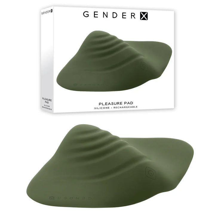 Gender X Pleasure Pad in Green below its retail box on white