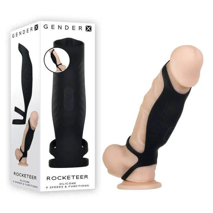 Gender X Rocketeer sleeve in Black fitted on a demo dildo, beside its retail box