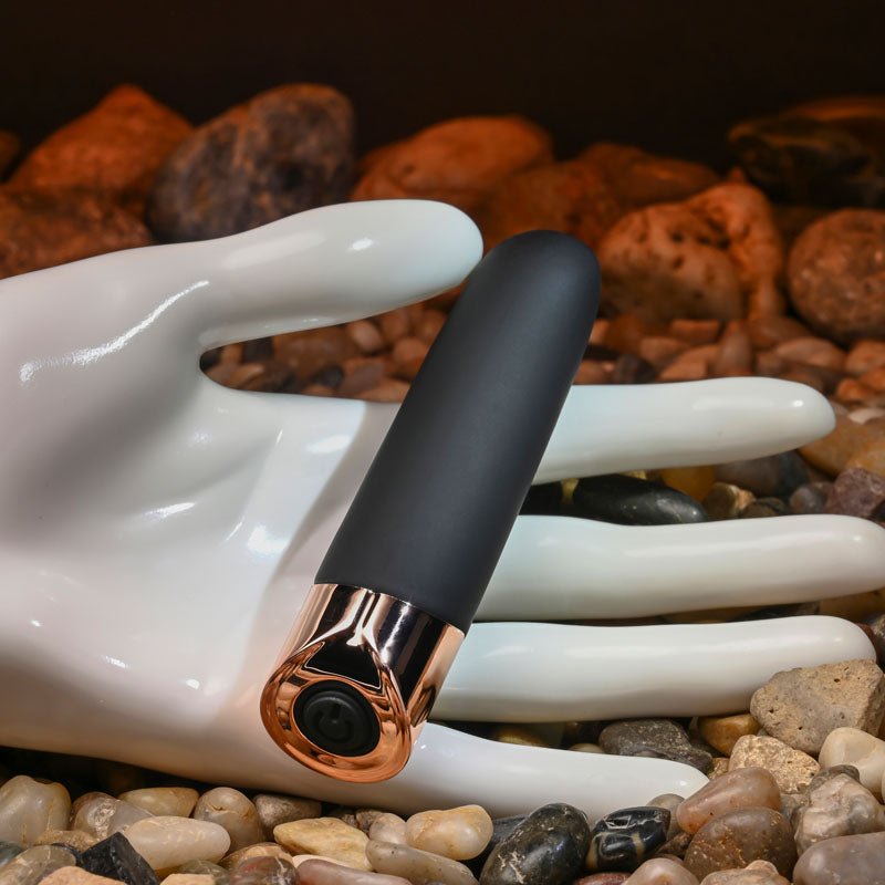Buy Gender X THE GOLD STANDARD - Black/Rose Gold 10 cm USB Rechargeable Bullet – Naughtyhut NZ sex toys online. Discreet delivery & top brands.