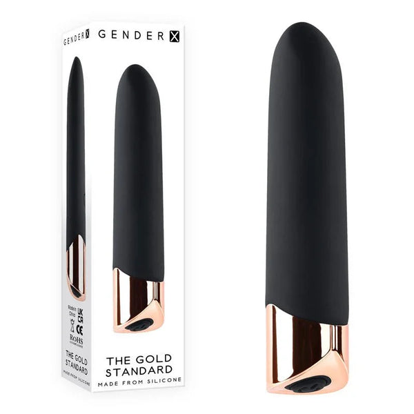 Gender X The Gold Standard bullet in Black and rose gold beside its retail box
