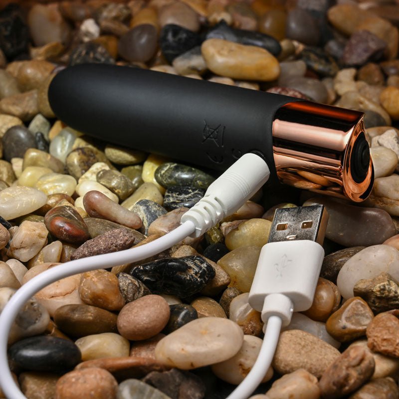 Buy Gender X THE GOLD STANDARD - Black/Rose Gold 10 cm USB Rechargeable Bullet – Naughtyhut NZ sex toys online. Discreet delivery & top brands.