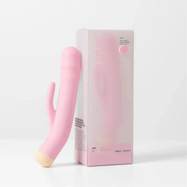 Girls Get Off DeeDee rabbit vibrator in Pink leaning on its pink box