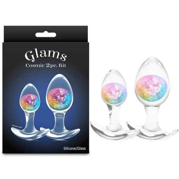 Glams Cosmic 2pc kit, two clear glass plugs with rainbow glitter gems beside the Glams box