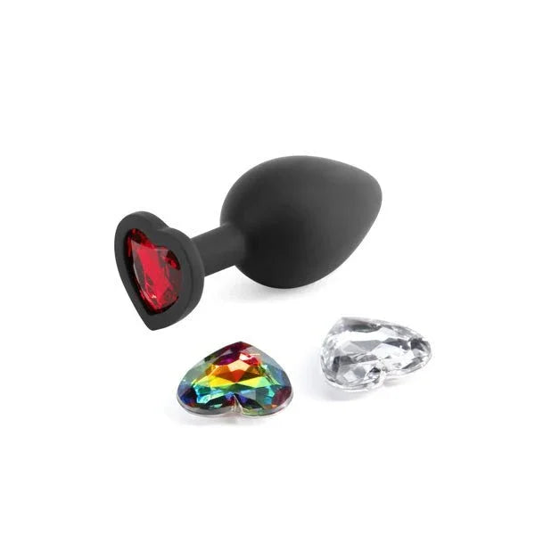 Glams Xchange Heart plug in Black, red gem fitted, with rainbow and clear gems alongside