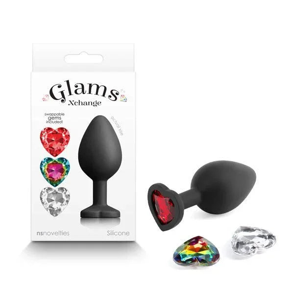 Glams Xchange Heart medium plug in Black with red heart gem, beside its box and spare gems