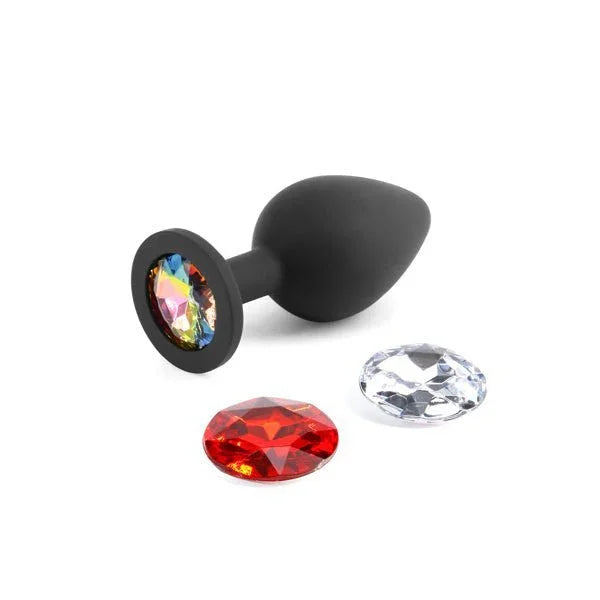 Glams Xchange Round plug in Black, rainbow gem fitted, red and clear gems alongside