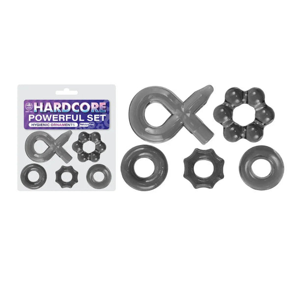 Hardcore Powerful set of 7 cock rings in Smoke, assorted shapes beside the blister card