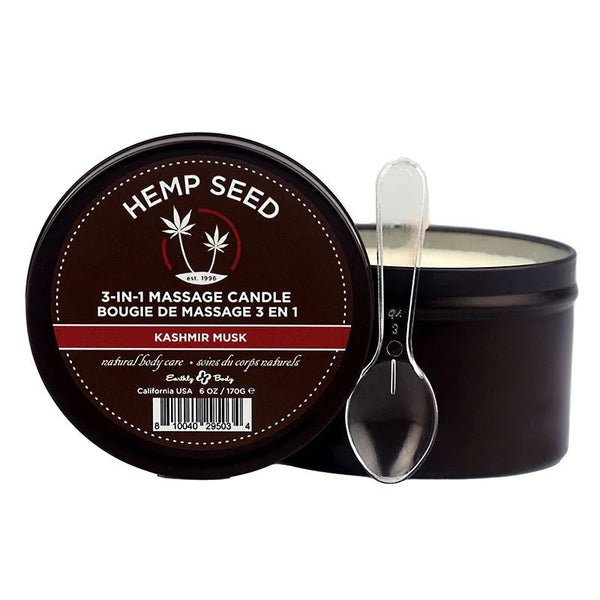Hemp Seed 3-in-1 Massage Candle in Kashmir Musk, open tin with pouring spoon