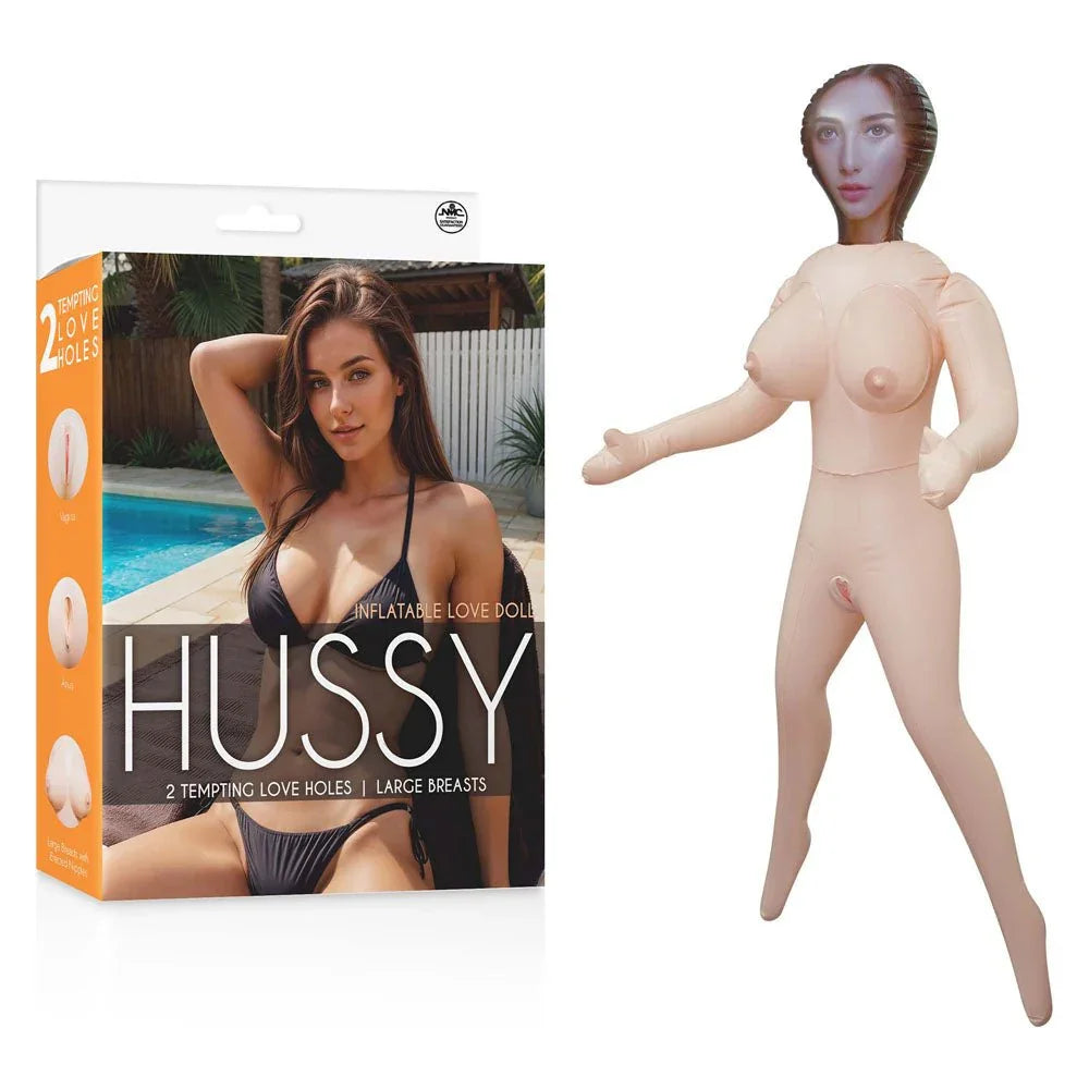 Hussy Elise inflatable doll standing beside her orange poolside photo box