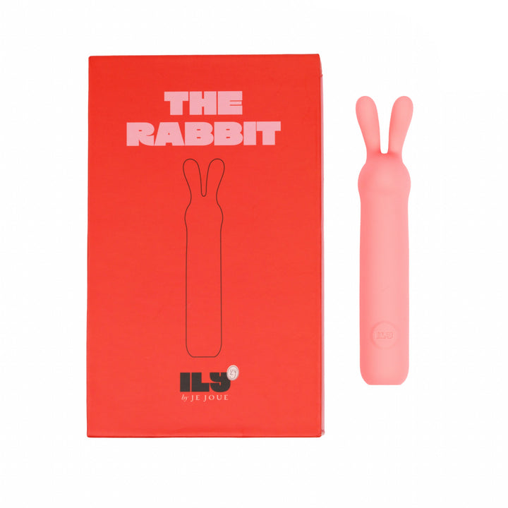 ILY The Rabbit coral pink vibrator beside its red retail box