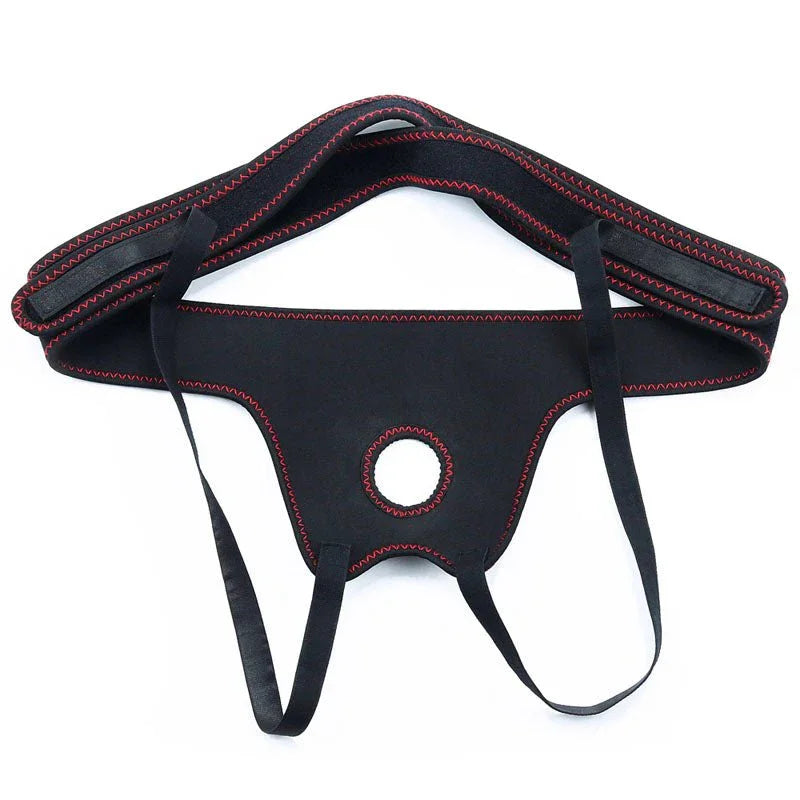 Black Ingen harness arranged front-on, the central O-ring and both leg straps spread out
