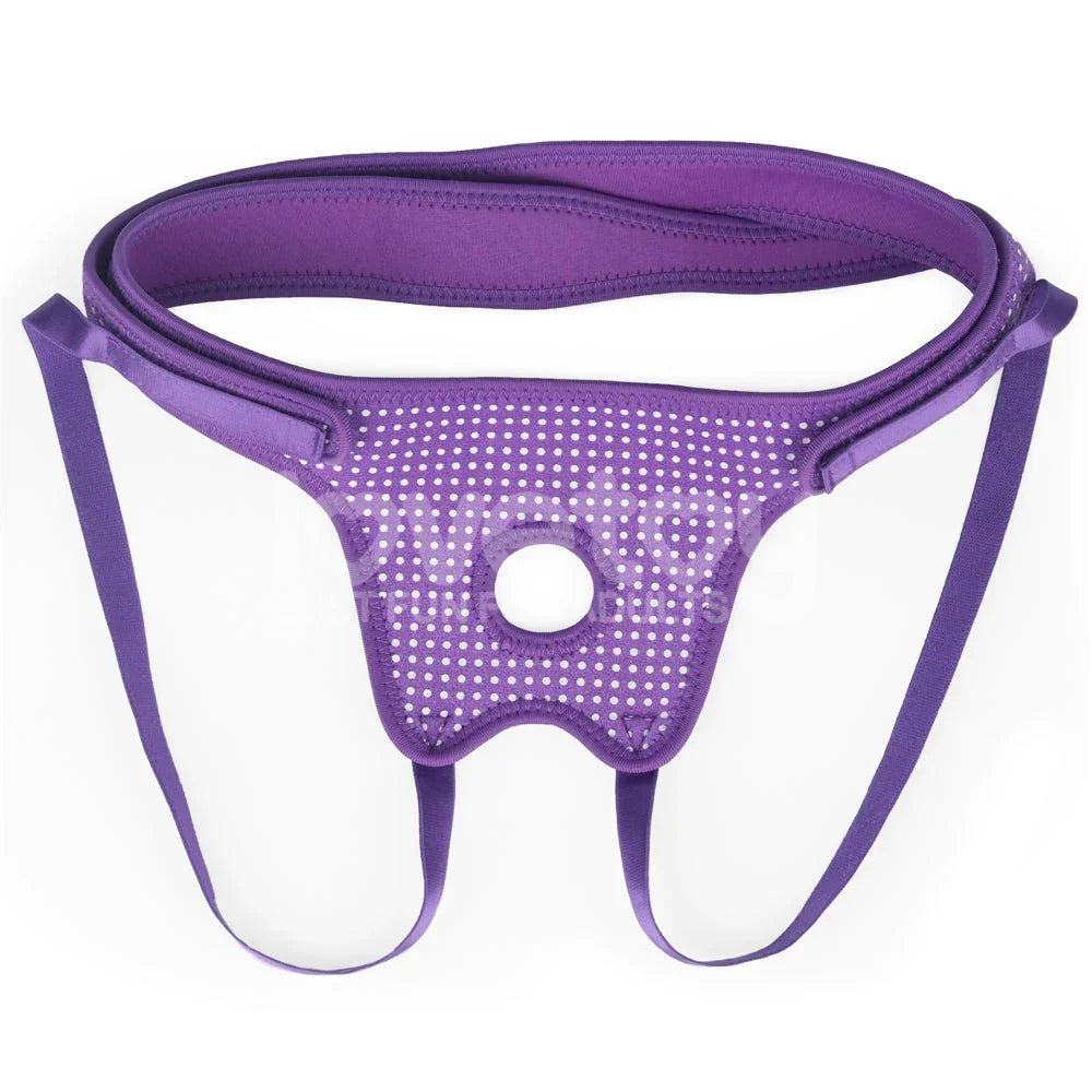 Purple Ingen strap-on harness laid out flat with the O-ring and straps visible