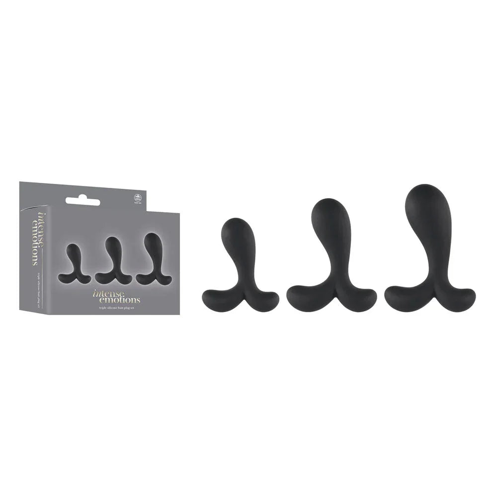 Intense Emotions set of 3 curved butt plugs in Black, lined up beside the grey box