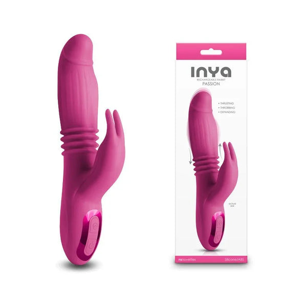 INYA Passion thrusting rabbit vibrator in Pink, upright beside its INYA box