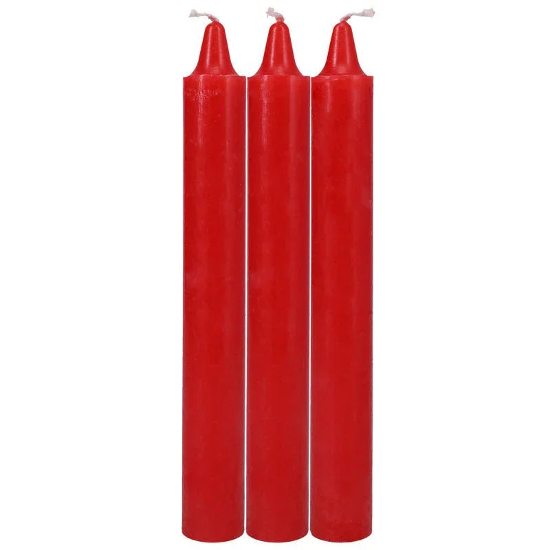 Doc Johnson Japanese Drip Candles in Red, three candles upright on white
