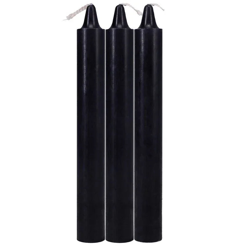 Doc Johnson Japanese Drip Candles in Black, three candles upright on white