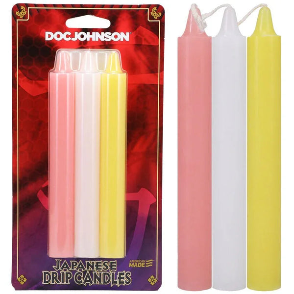 Doc Johnson Japanese Drip Candles 3-pack, pink, white and yellow, beside the card