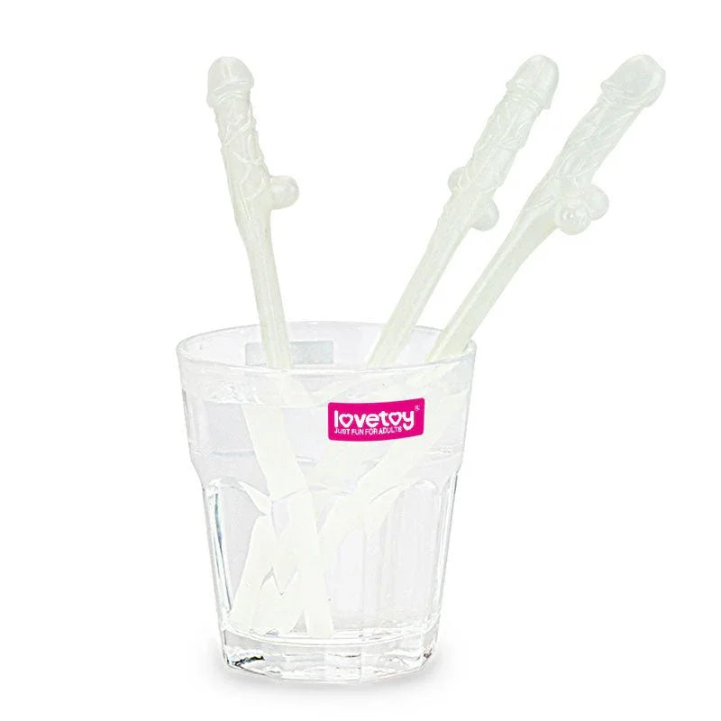 Three willy straws standing in a glass tumbler of water, ready to serve