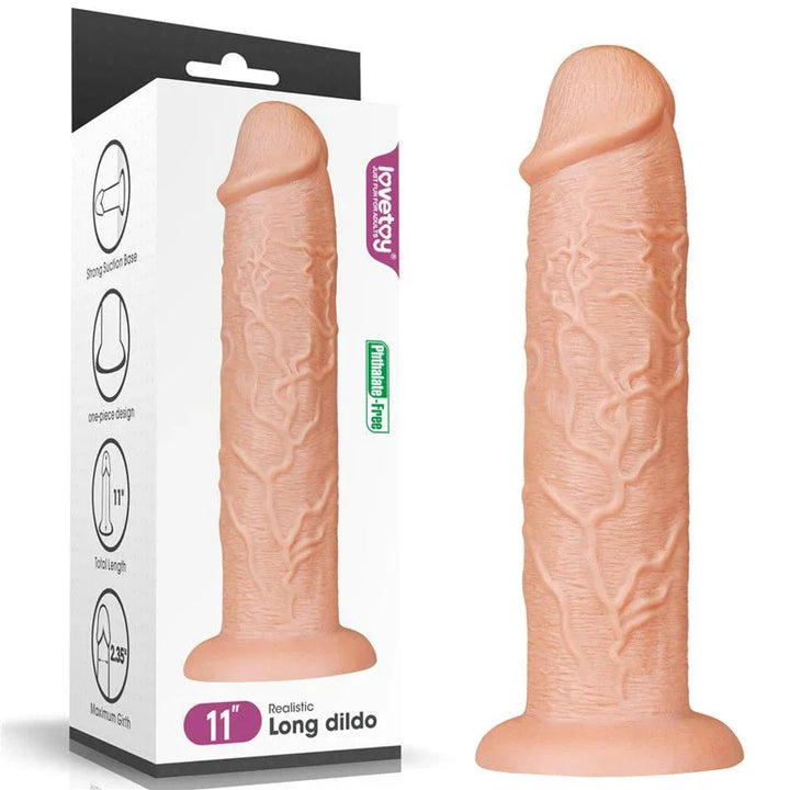 Lovetoy King Size 11 inch realistic dildo in Flesh beside its Long Dildo retail box