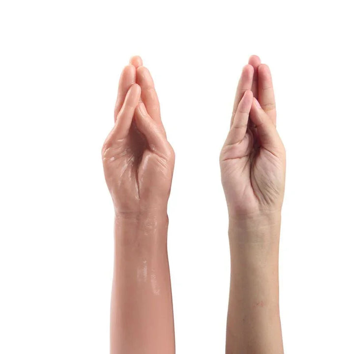 Magic Hand dildo next to a real arm and hand in the same pose, showing it is life sized