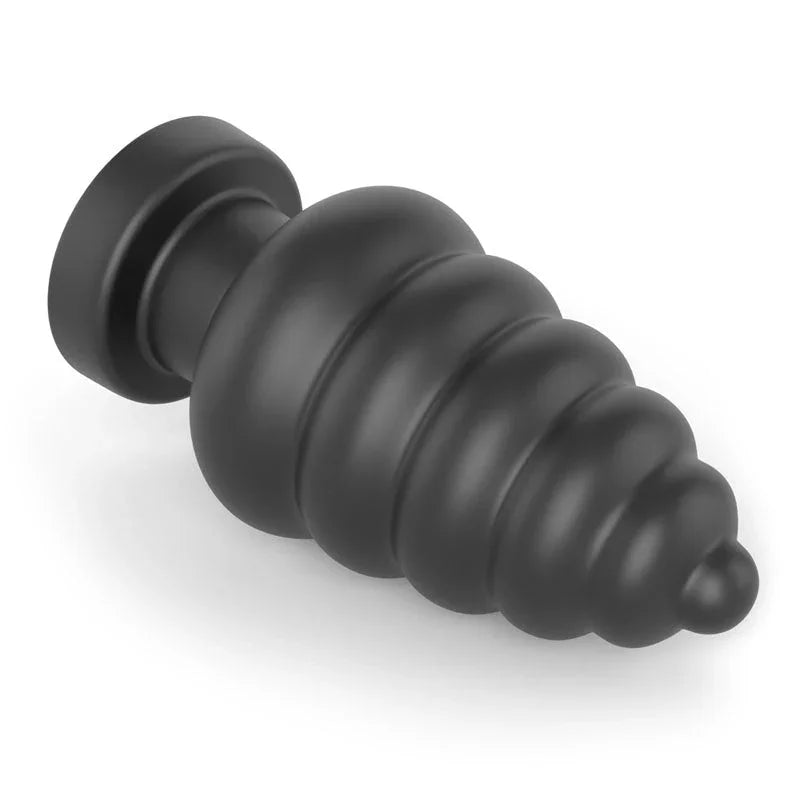 Black Anal Cracker plug lying on its side on white, ridged cone and flat round base