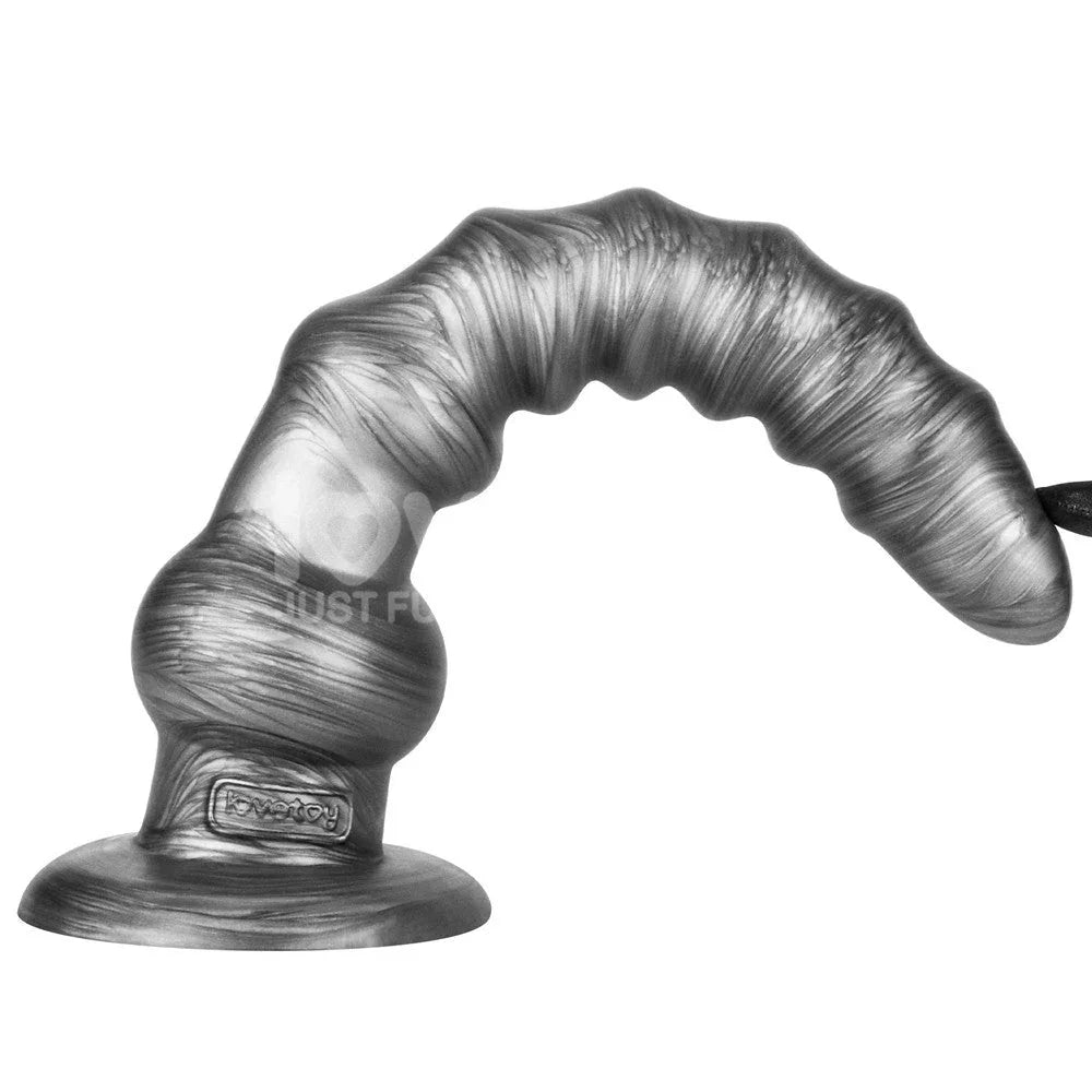 Vibrax Slider 12.5 inch bowed over on its suction cup, showing how far the shaft bends