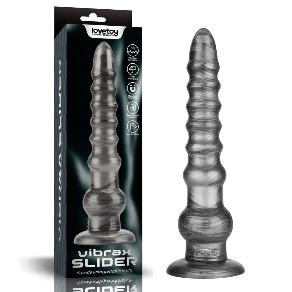Lovetoy Vibrax Slider 12.5 inch vibrating dildo in Grey beside its black retail box