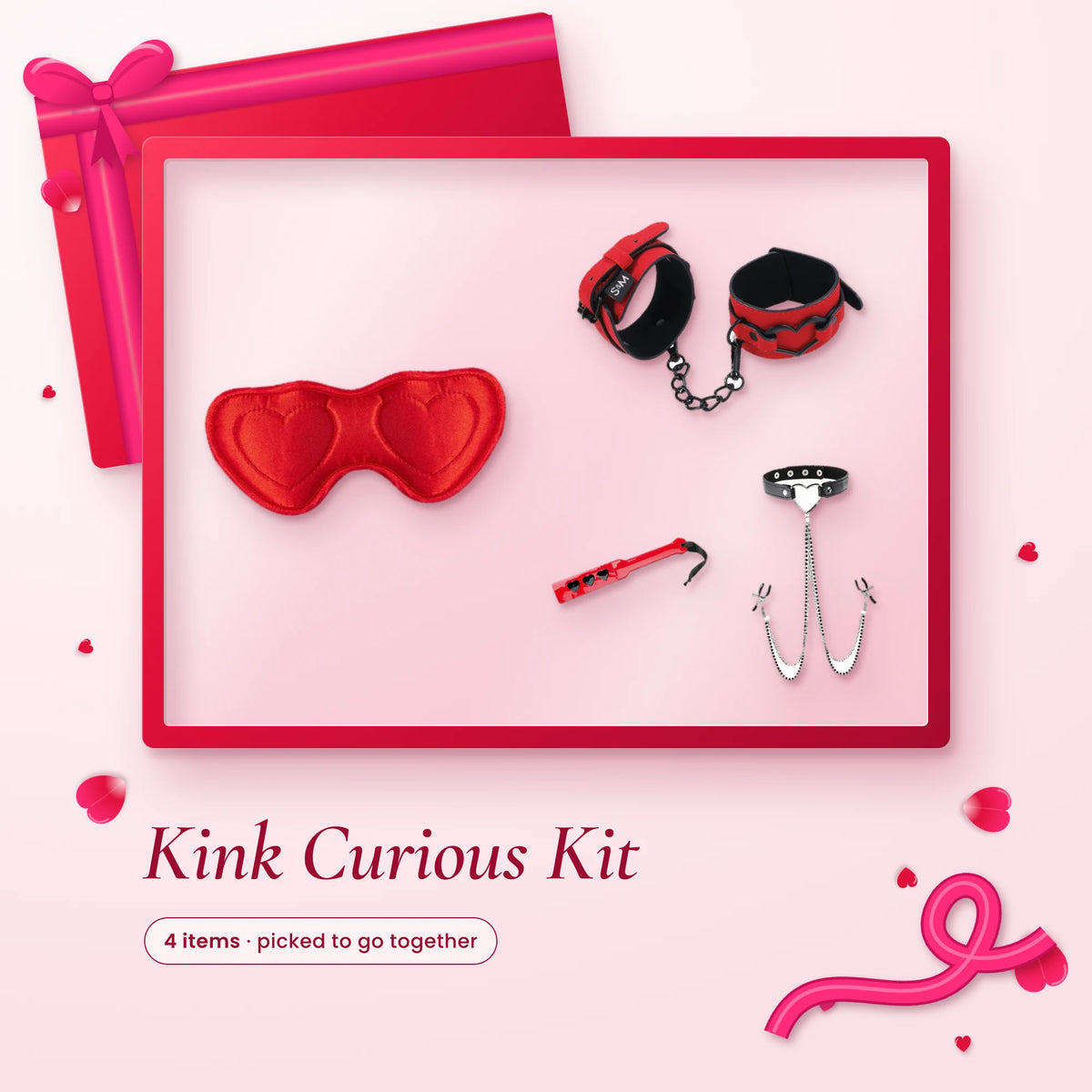 Kink Curious Kit: a red heart satin blindfold, red cuffs, a heart spanking paddle and a collar with nipple clamps