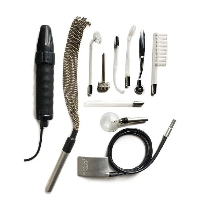 Agent Noir contents flat-lay, wand, chain flail and glass electrodes