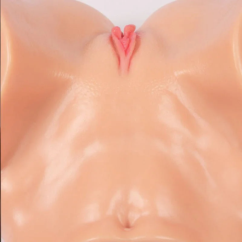 Close-up of the Adel 001 mound and navel, showing the smooth skin texture