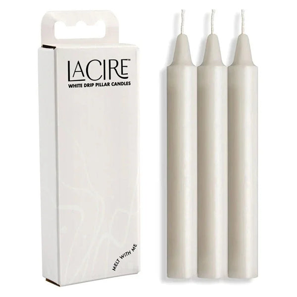 LaCire White Drip Pillar Candles: white carton beside the three ivory candles