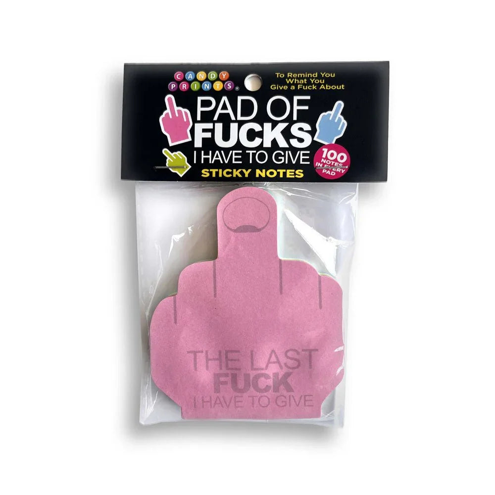 Pad of Fucks I Have To Give sticky notes, pink finger-shaped pad in its header pack